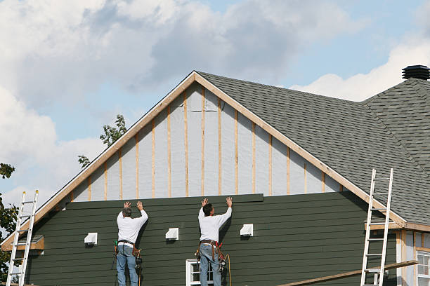 Professional Siding Installation technician working in Munson, PA